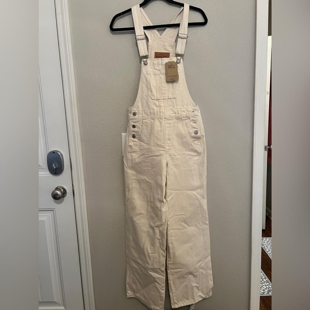 Levi’s white overalls with tags